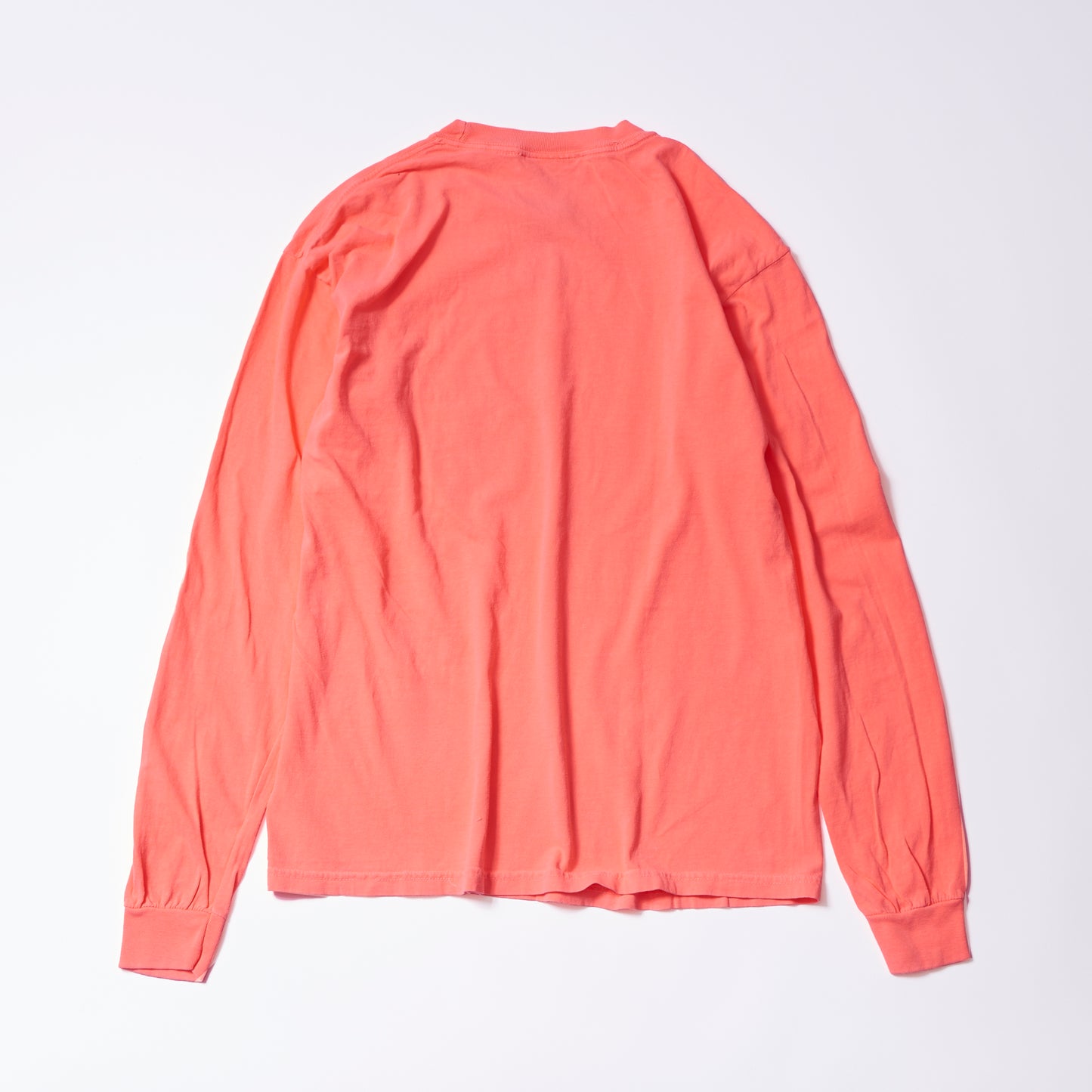 Long sleeve T-shirt (fluorescent salmon pink) | No one is free until we are all free