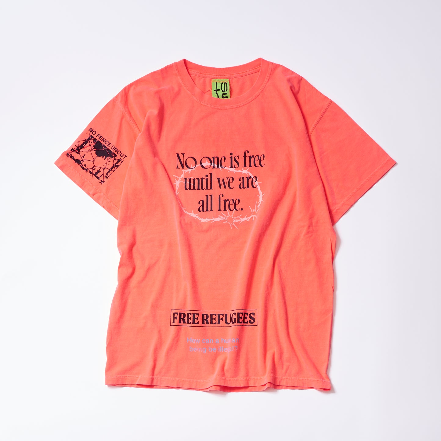 T-shirt (fluorescent salmon pink) | No one is free until we are all free