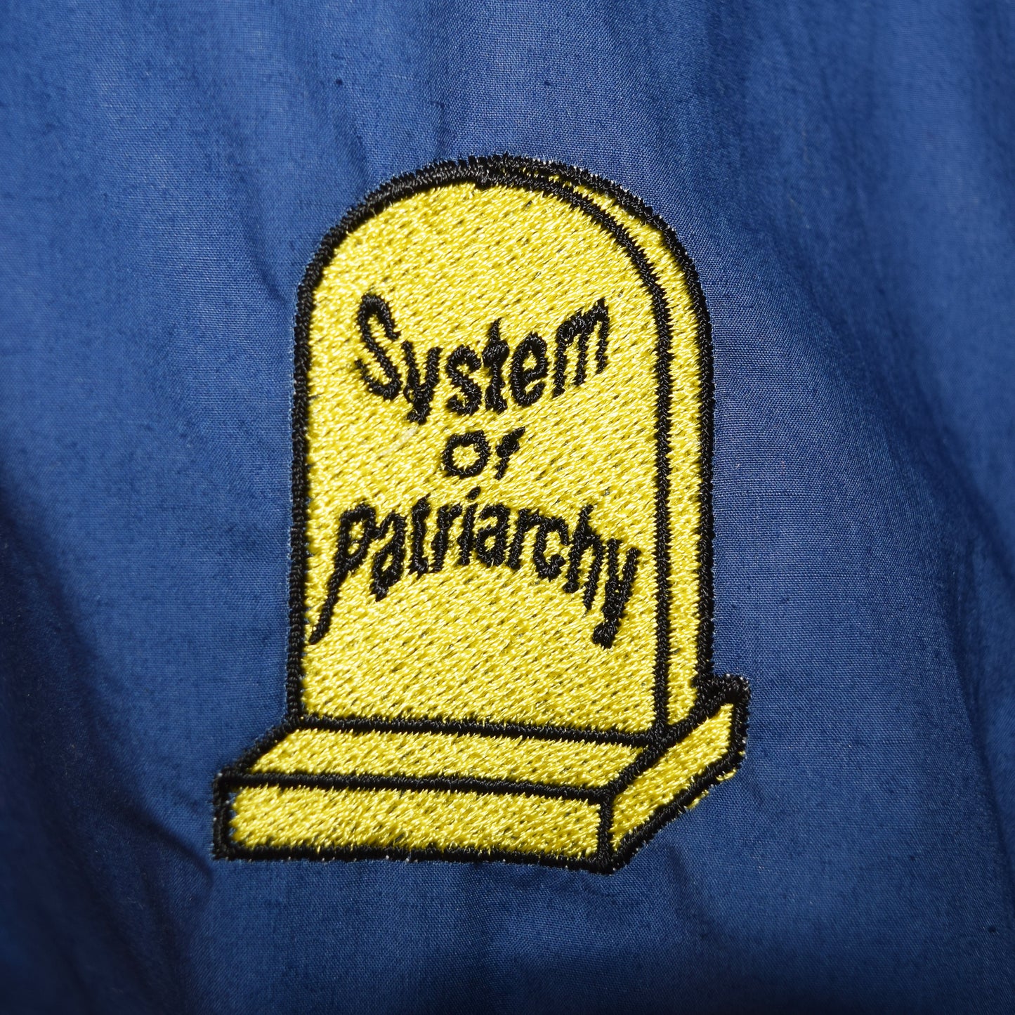 フード付きアウター（ブルー）｜家父長制の墓（刺繍）